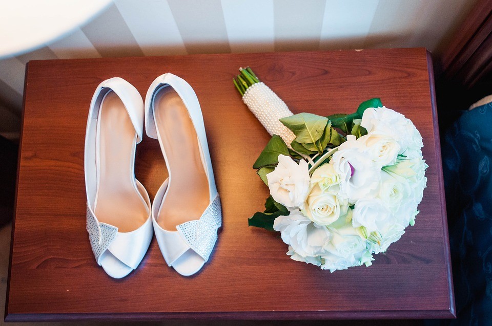 bridal shoes and wedding bouquet