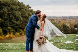 bride and groom kissing 