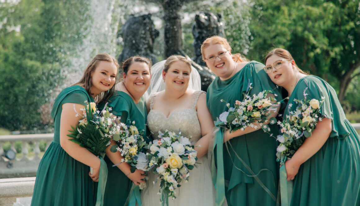 bride and bridesmaids in green dresses
